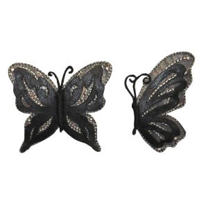 May include: Two black butterfly-shaped embellishments with a glittery finish.