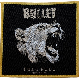 May include: Black and white embroidered patch with a roaring lion's head and the text "BULLET FULL PULL ©2012 BULLET".