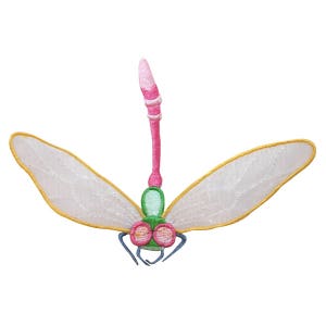 May include: A pink and green embroidered dragonfly with white wings and a yellow border. The dragonfly is facing down with its wings spread out.