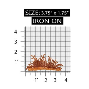May include: Iron-on patch of a brown grass bush, measuring 3.75 inches by 1.75 inches. The patch is shown on a grid for size reference.