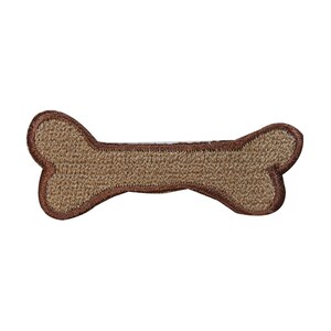 Könnte beinhalten: Ein brauner Filz-Hunde-Knochen-Patch mit braunem gesticktem Umriss.