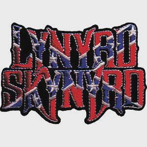 May include: Embroidered patch featuring the band name "LYNYRD SKYNYRD" in a bold, stylized font. The letters are red and blue, with a design reminiscent of a flag. The patch has a black border and a stitched appearance.