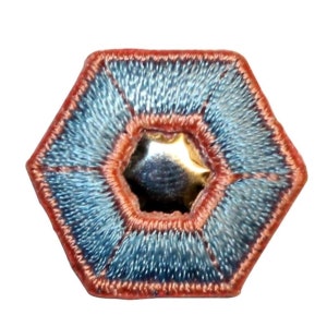 May include: A hexagonal blue and red embroidered patch with a silver star in the center.