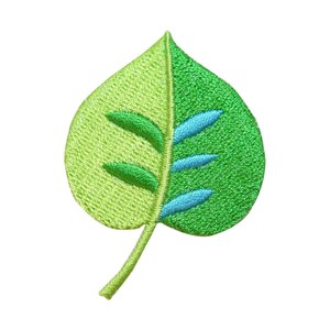 May include: An embroidered leaf in shades of green, with a blue vein running down the centre. The leaf has a simple design with a rounded tip and a pointed base.