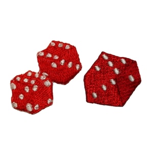 May include: Two red dice with white dots, embroidered on fabric.