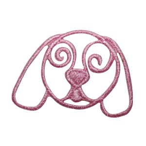 May include: Pink embroidered outline of a dog's face with curly eyes and a nose.