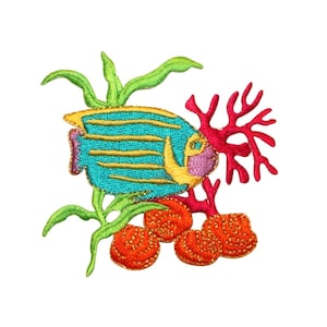 May include: An embroidered iron-on patch featuring a blue and yellow angelfish swimming near coral and seaweed. The coral is red and the seaweed is green. There are three orange and yellow coral balls.