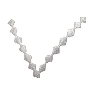 May include: White decorative trim with a diamond pattern.