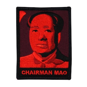 May include: Red embroidered patch with a portrait of Chairman Mao in a red and black color scheme. The patch has a black border and the text "CHAIRMAN MAO" at the bottom.