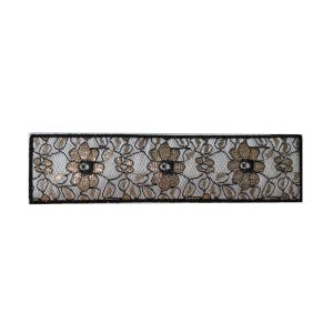 May include: Black lace trim with gold floral embroidery. The trim has a delicate, intricate design.