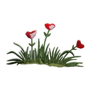 May include: Embroidered patch of a green grass patch with three red and white heart-shaped flowers.