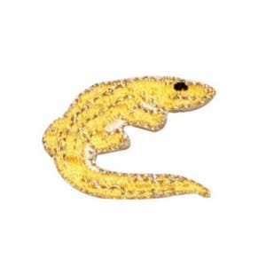 May include: Yellow embroidered gecko applique patch. The gecko is curled in a C shape with its tail wrapped around its body.