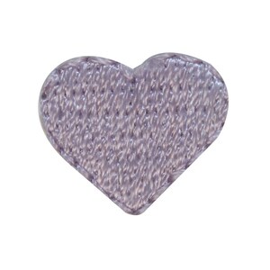 May include: A small, purple heart-shaped patch made of fabric with a textured surface.