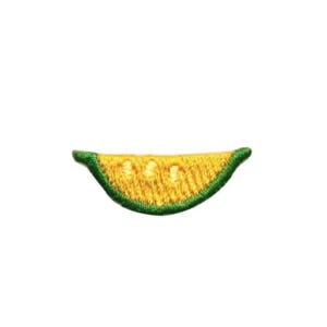May include: A yellow embroidered melon slice with a green outline.