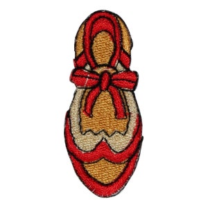 May include: A red and gold embroidered patch of a shoe with a red bow.