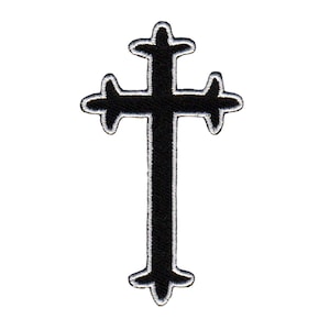 May include: A black embroidered cross with a white outline. The cross has a simple, traditional design.