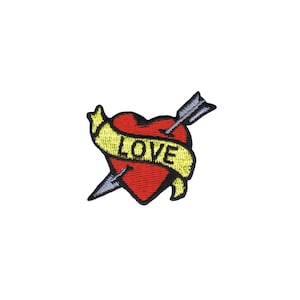 May include: A red heart with an arrow through it and a yellow banner that says "LOVE" in black lettering.
