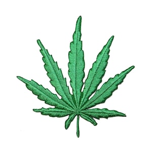 May include: A green embroidered marijuana leaf patch. The leaf is detailed with multiple points and a central vein.