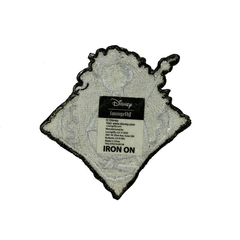 May include: A white iron-on patch featuring a black and white illustration of a Disney character. The patch has the text "Disney loungefly" and "IRON ON" on it.