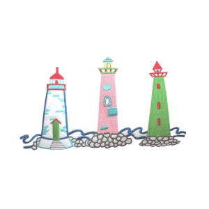 May include: Three embroidered lighthouses on a white background. The lighthouses are different colors: blue and white, pink, and green. The lighthouses are on a rocky shore with blue waves.