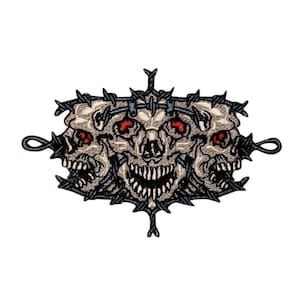 May include: Embroidered patch featuring three white skulls with red eyes, surrounded by barbed wire. The skulls are grinning and have sharp teeth. The patch is a dark blue colour.