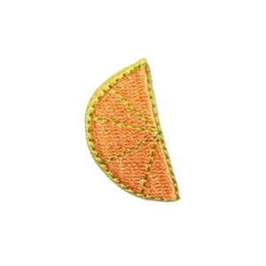 May include: A bright orange embroidered patch of a slice of orange with a yellow outline.