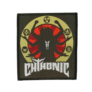 May include: Embroidered patch with a black background featuring a silhouette of a multi-armed figure in front of a red circle. The figure is surrounded by a gold circle with symbols. The word "CHTHONIC" is embroidered in white.
