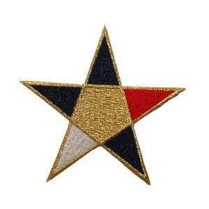 May include: A gold five-pointed star patch with red, white and blue accents. The star is embroidered with a gold thread and has a textured surface.