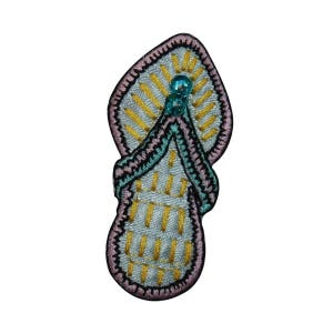 May include: A white, yellow, and blue embroidered patch shaped like a sandal. The patch has a pink border and a black outline.