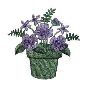 May include: An embroidered patch depicting a bouquet of purple flowers in a green pot. The flowers are a light shade of purple and are arranged in a cluster. The pot is a simple green design.
