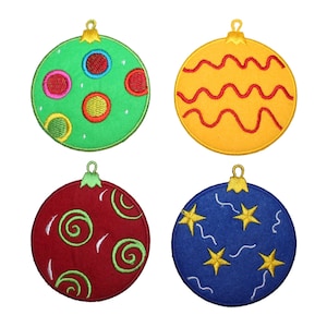 May include: Four felt Christmas ornaments in different colors and designs. The ornaments are green with colorful circles, yellow with red wavy lines, red with green swirls, and blue with gold stars.