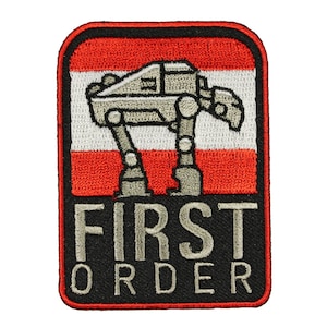 May include: A red, white, and black embroidered patch with a stylized image of an AT-ST walker and the text "FIRST ORDER".