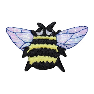 May include: A black and yellow embroidered bumble bee with iridescent blue wings. The bee is a cartoon-style design with large eyes.