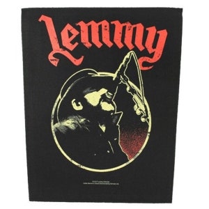 May include: Black and red embroidered patch with the word "Lemmy" in a large, stylized font. A silhouette of a person singing into a microphone is in a circle in the center of the patch.