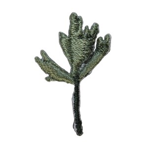 May include: A green embroidered patch of a stylized tree with a single trunk and multiple branches.