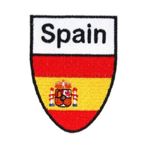 May include: A red, yellow, and red embroidered patch with the Spanish flag and the word "Spain" in black text.
