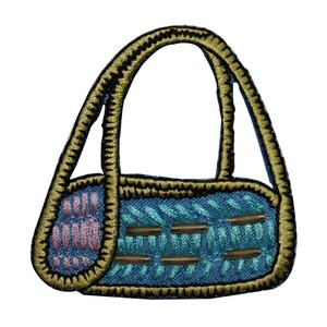 May include: A blue and gold embroidered handbag with a pink and white patterned design. The handbag has a top handle and a zipper closure.