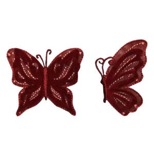 Può includere: Due decorazioni a forma di farfalla in velluto rosso con un delicato design ricamato. Queste farfalle decorative sono perfette per aggiungere un tocco di fantasia a lavori artigianali, abbigliamento o arredamento.