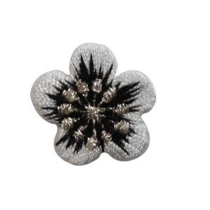 May include: White embroidered flower patch with a black and silver center.
