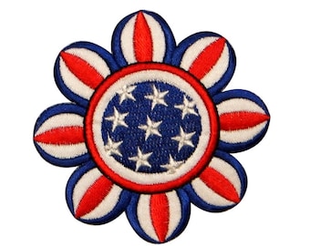 May include: A red, white, and blue embroidered flower patch with a circle of stars in the center. The flower has seven petals.