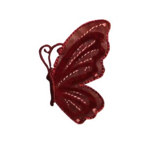 May include: A red velvet butterfly with a sheer overlay. The butterfly has a delicate, intricate design and is perfect for adding a touch of whimsy to any project.