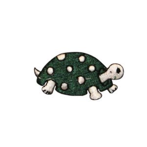 May include: A green turtle with white polka dots and a white outline. The turtle is walking to the right.