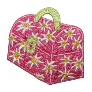 May include: Pink embroidered patch shaped like a small suitcase with a green handle. The suitcase is decorated with white and yellow flowers.