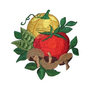 May include: Embroidered patch featuring a yellow pumpkin, a red tomato, and brown mushrooms with green leaves.