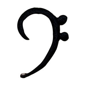 May include: Black bass clef made of fabric with a textured surface.