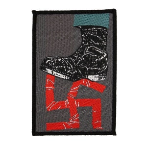 May include: A black boot steps on a red swastika that is taped with white tape. The boot is on a gray background.