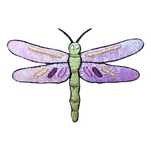 May include: Purple and green embroidered dragonfly with iridescent wings.