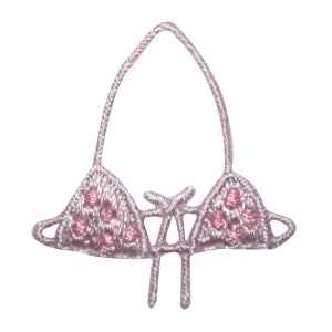 May include: A pink crocheted bikini top with a pink and white polka dot pattern.