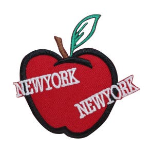 May include: Red apple with a green leaf and a black outline. The apple has the word "NEW YORK" written on it twice, once horizontally and once diagonally.