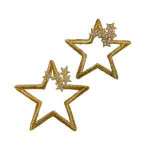 May include: Two gold star-shaped embroidery patches with a cluster of smaller silver stars in the center of each.